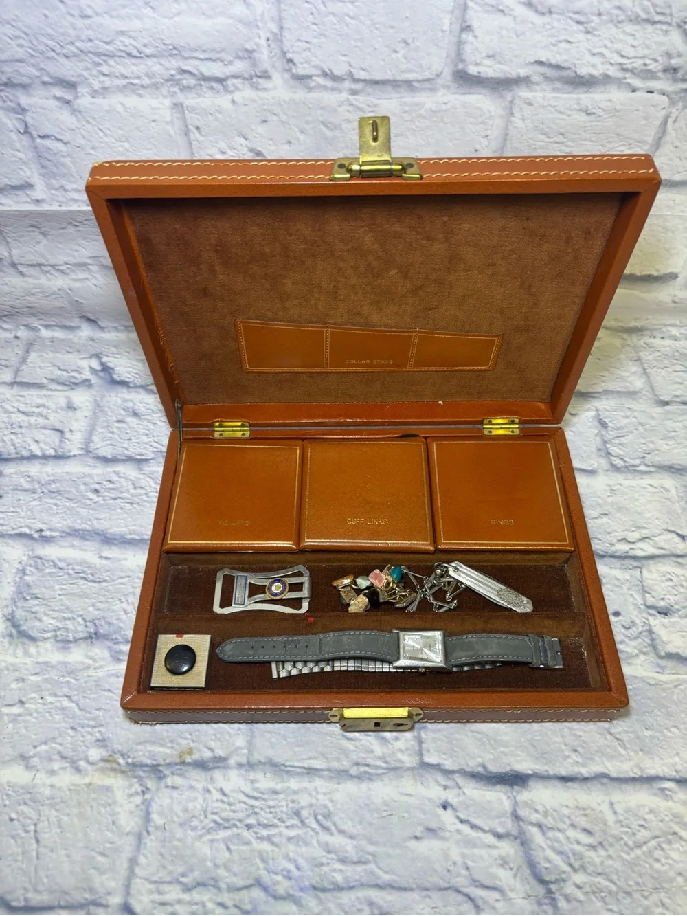 Mid century jewelry box with all the jewelry seen in pictures. Cuff links, tie